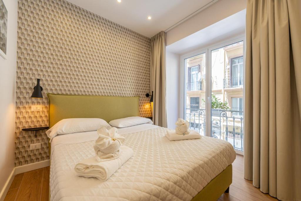 Giường trong phòng chung tại Relais Sole