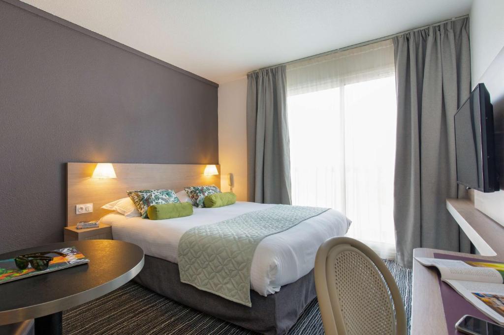 Postel nebo postele na pokoji v ubytování Best Western Plus La Marina