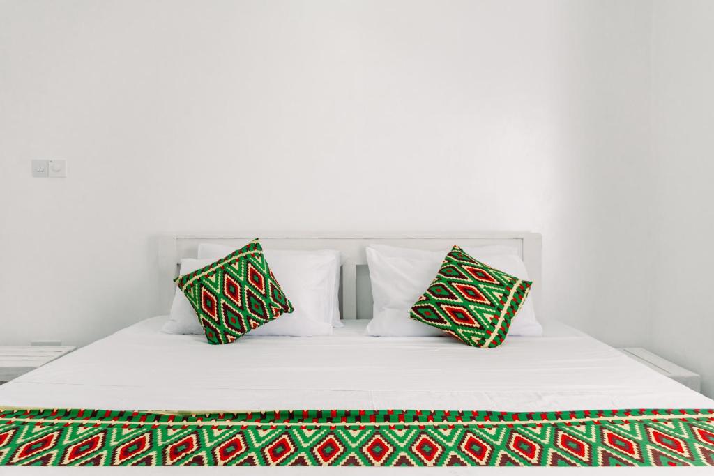 Postel nebo postele na pokoji v ubytování Avana Resort Watamu