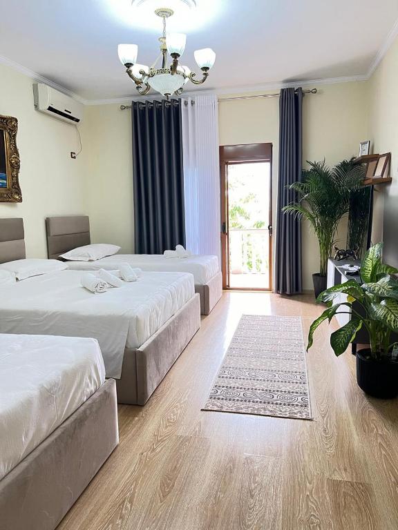 Postel nebo postele na pokoji v ubytování Kasmi Home 2