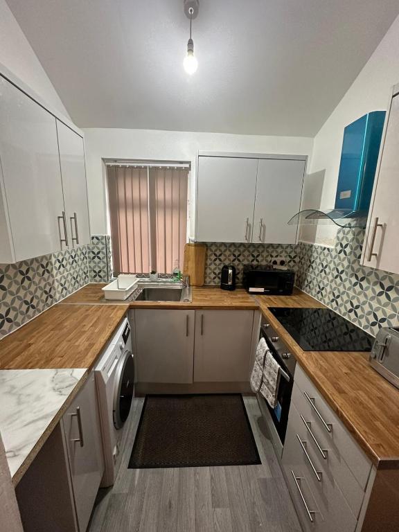 Kuchyň nebo kuchyňský kout v ubytování Dans Place