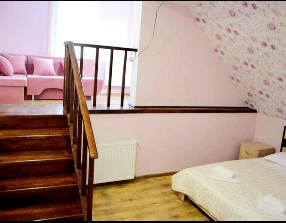 Postel nebo postele na pokoji v ubytování Guest House Lotus