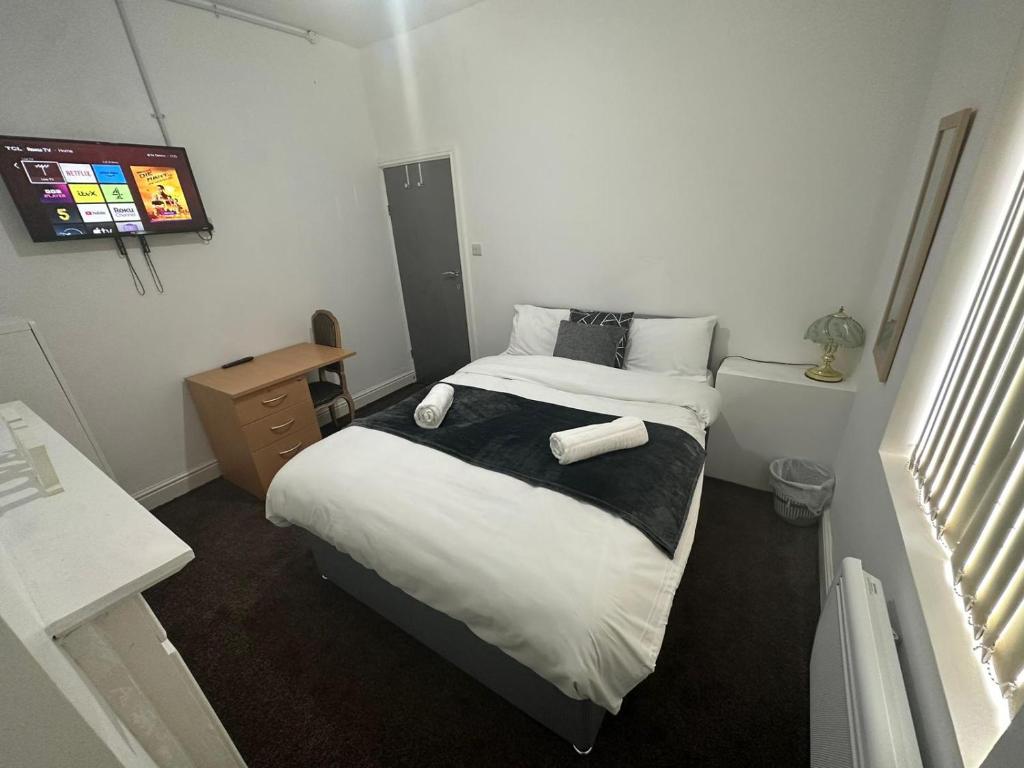 Postel nebo postele na pokoji v ubytování Dans Place