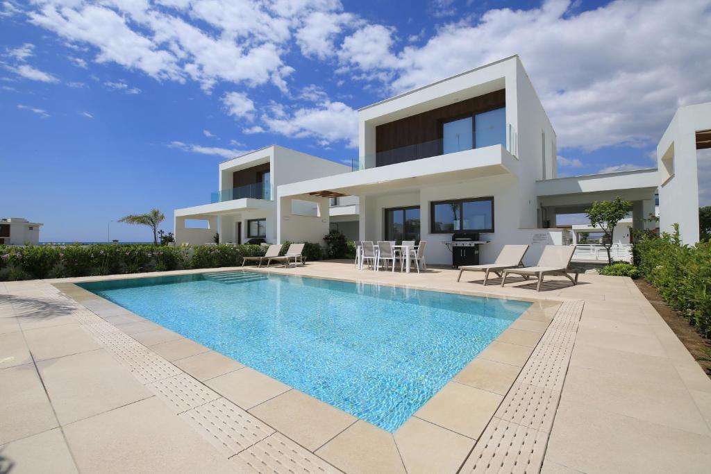 Bazén v ubytování Serenity Waves Villa 27 nebo v jeho okolí