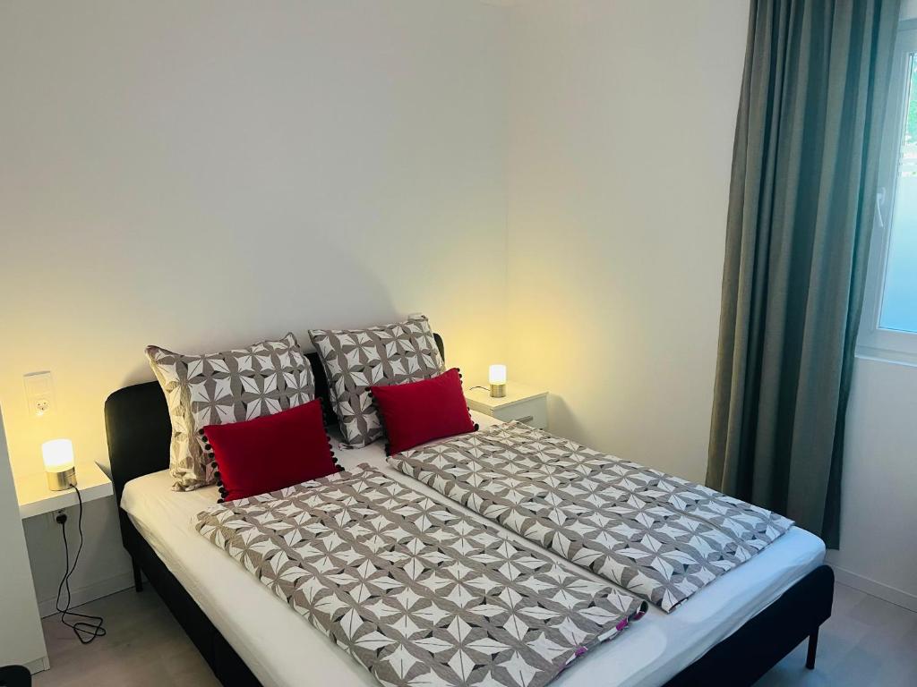 Posteľ alebo postele v izbe v ubytovaní Marton Apartman