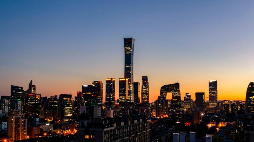 a view of a city skyline at sunset at Beijing Jingfang Building - Near Tiananmen Square and the Forbidden City,Newly opened hotel,Heating is provided during winter in Beijing