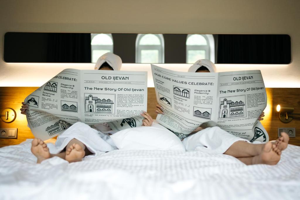 Postel nebo postele na pokoji v ubytování Old Ijevan Boutique Hotel
