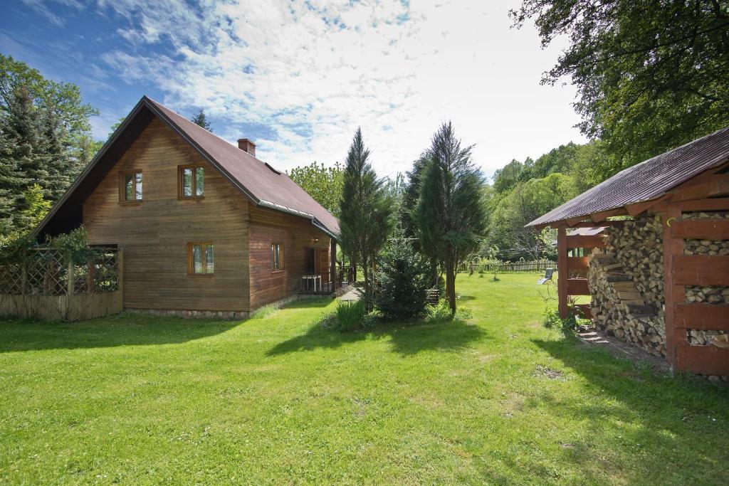 Vonkajšia záhrada v ubytovaní Chata za wsią
