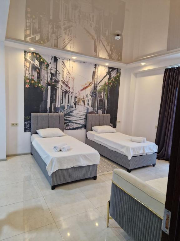 Postel nebo postele na pokoji v ubytování New House Kobuleti 2