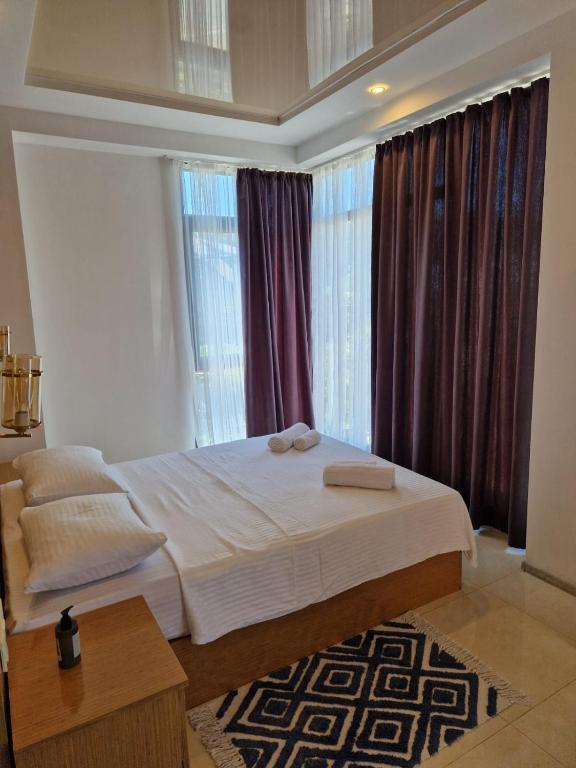 Postel nebo postele na pokoji v ubytování New House Kobuleti 2