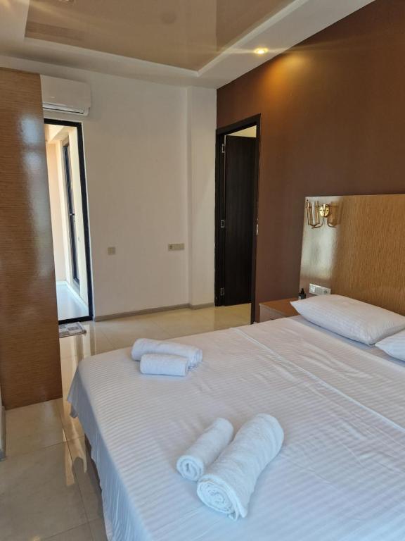 Postel nebo postele na pokoji v ubytování New House Kobuleti 2