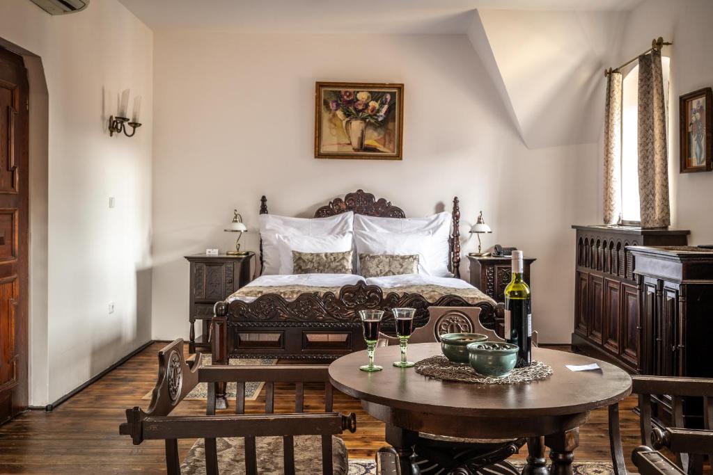 Postel nebo postele na pokoji v ubytování Hotel Ruze