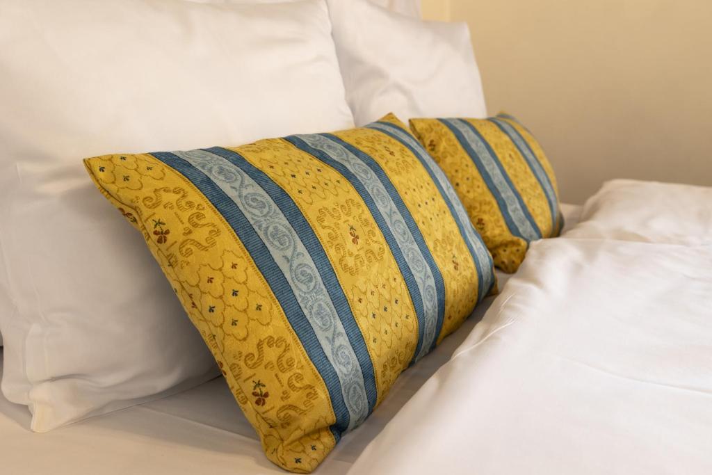 Postel nebo postele na pokoji v ubytování Hotel Ruze