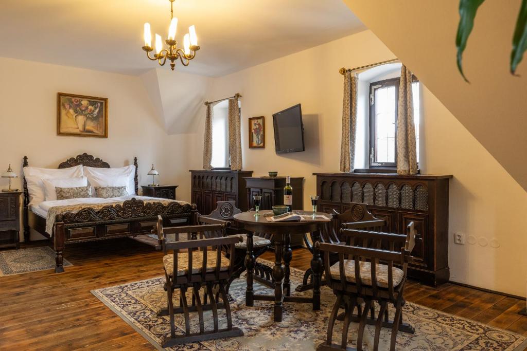 Postel nebo postele na pokoji v ubytování Hotel Ruze