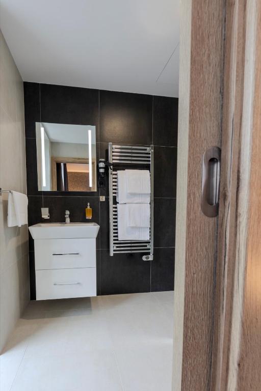 Kuchyň nebo kuchyňský kout v ubytování Hotel Tříška