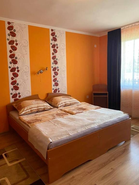 Postel nebo postele na pokoji v ubytování PICNIC Vendégház