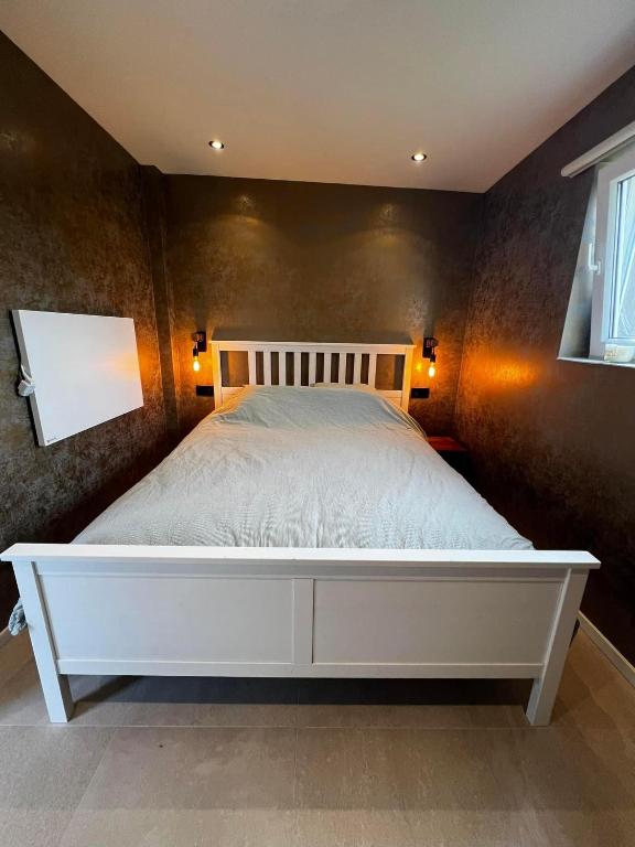 Postel nebo postele na pokoji v ubytování Garden Suite Monaco