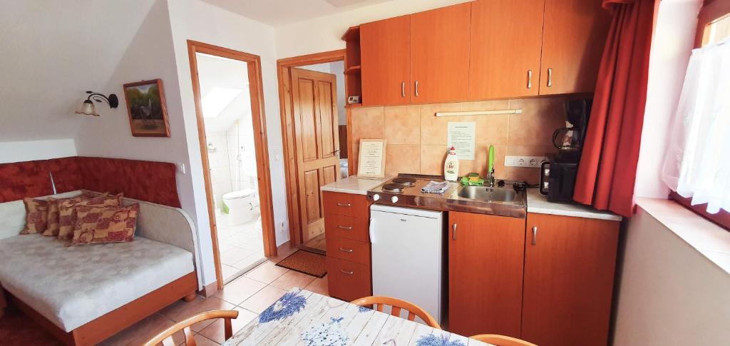 Kuchyň nebo kuchyňský kout v ubytování Apart Júlia Villa