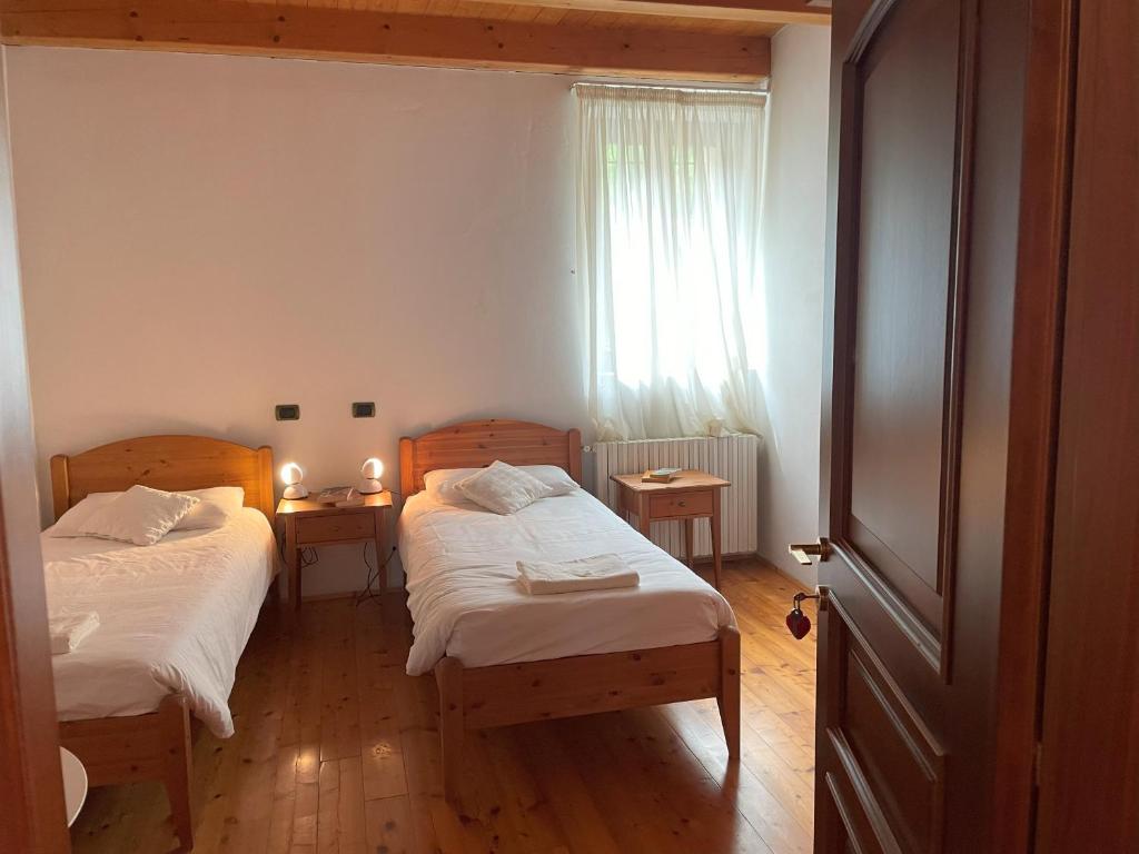 Postel nebo postele na pokoji v ubytování Casa Ciuca