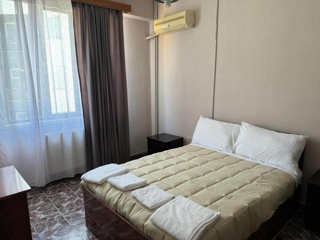 Postel nebo postele na pokoji v ubytování SIRENA HOTEL