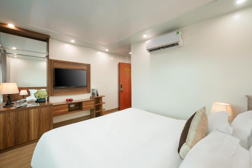 Postel nebo postele na pokoji v ubytování DUNG LAI HOTEL 173