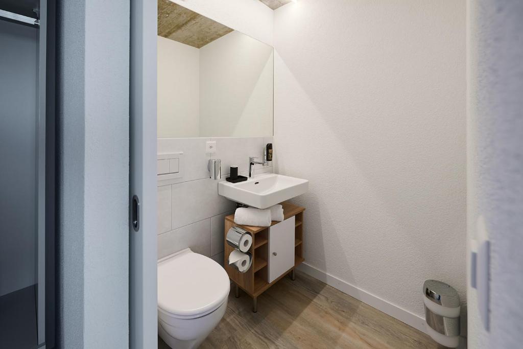 Koupelna v ubytování Aabach Hotel