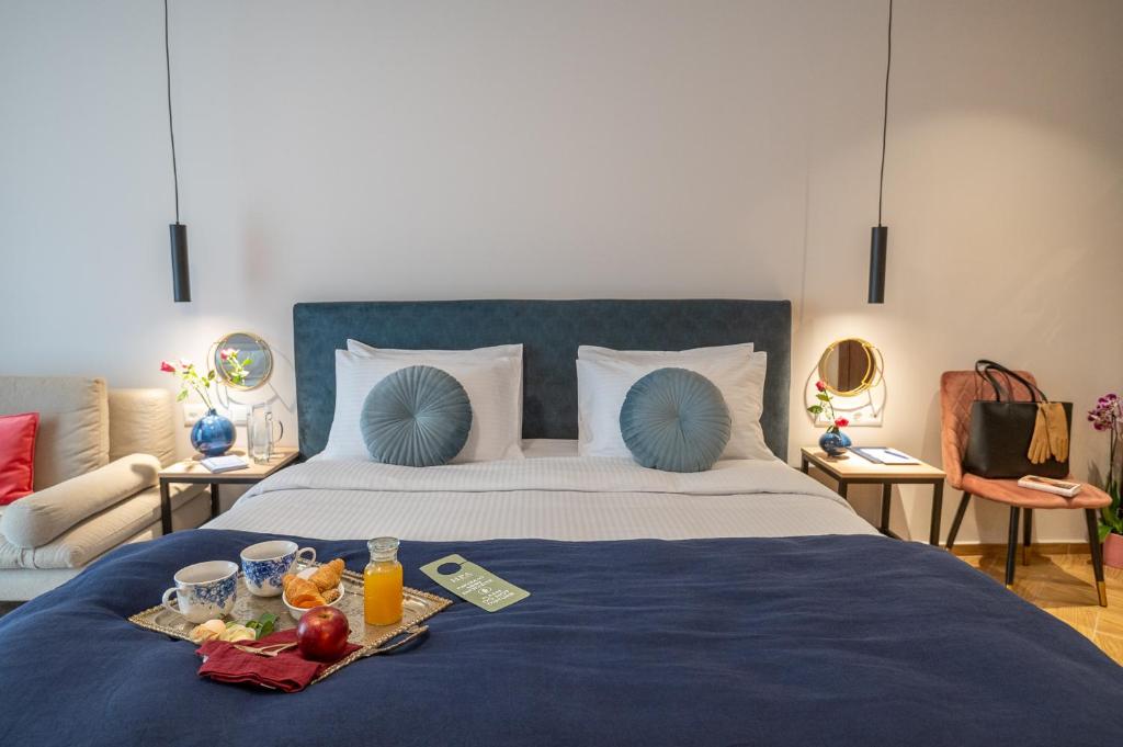 Postel nebo postele na pokoji v ubytování IRA - ΗΡΑ Hotel