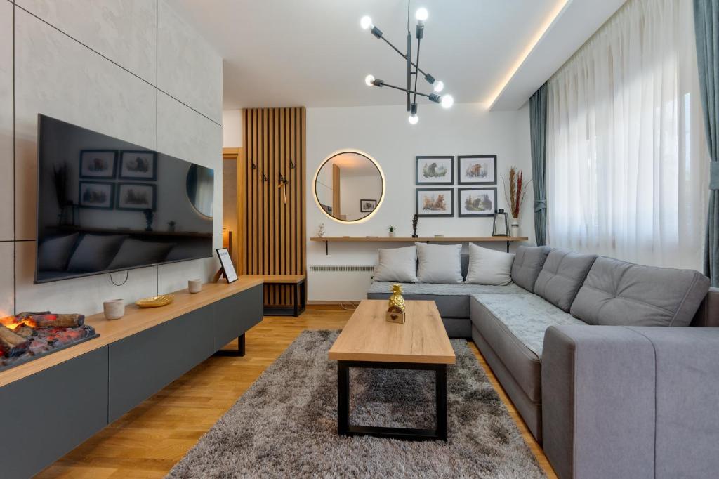 Posezení v ubytování Lazy Bear Moderan Spa na Planini