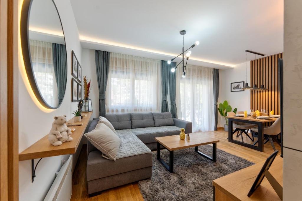 Posezení v ubytování Lazy Bear Moderan Spa na Planini