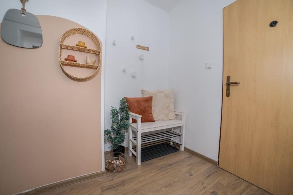 Postel nebo postele na pokoji v ubytování Velký apartmán V Pralese Šumava
