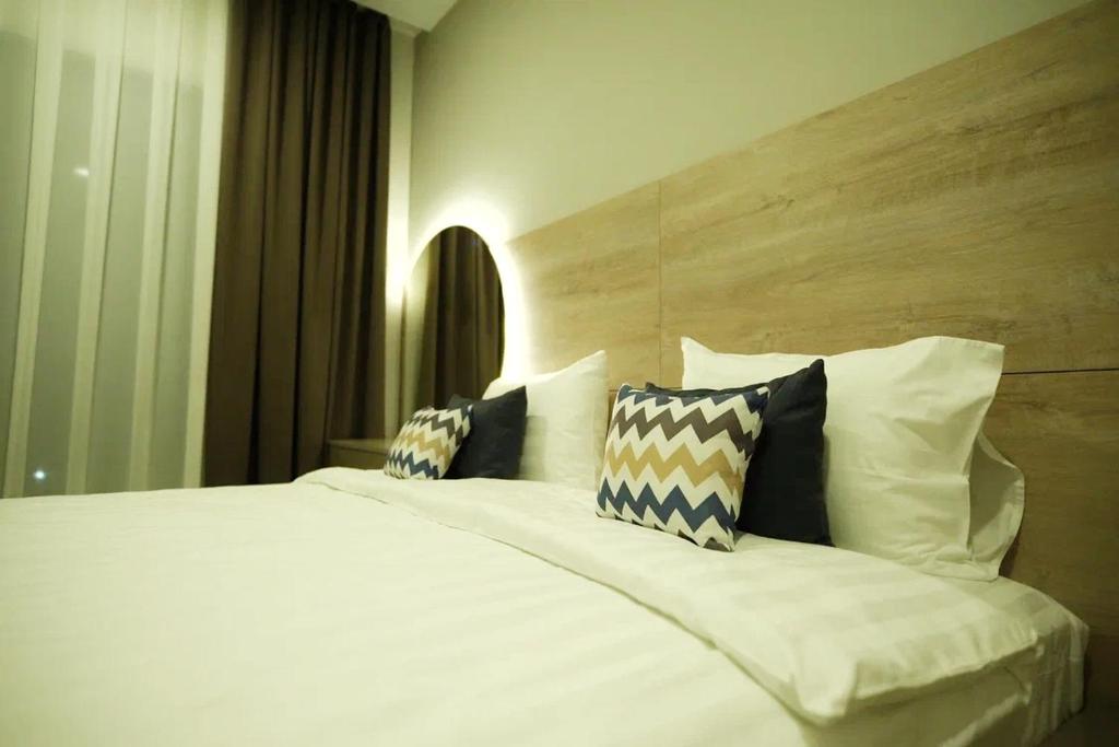 Postel nebo postele na pokoji v ubytování 4Guest Hotel