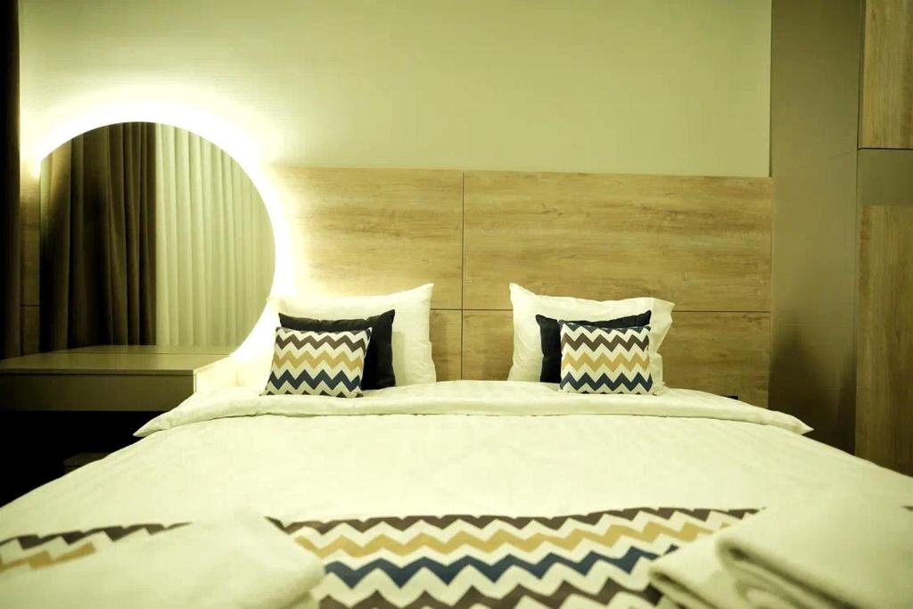 Postel nebo postele na pokoji v ubytování 4Guest Hotel