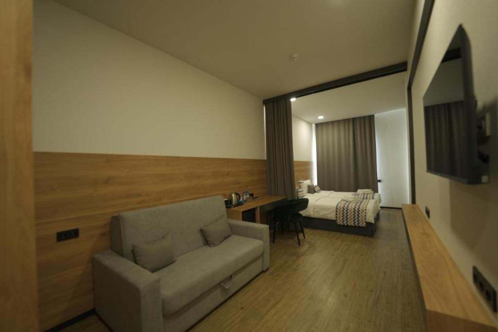 TV a/nebo společenská místnost v ubytování 4Guest Hotel