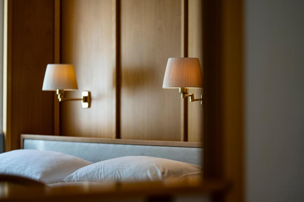 Postel nebo postele na pokoji v ubytování Sporthotel am Semmering