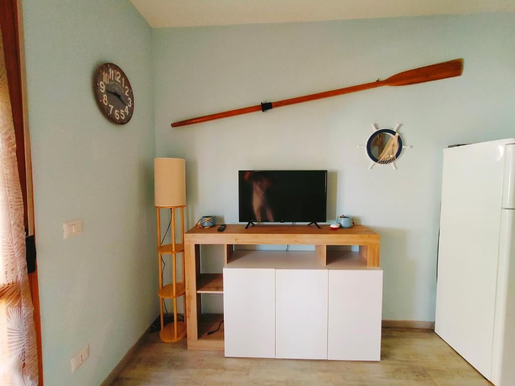 TV a/nebo společenská místnost v ubytování IL PICCOLO REMO
