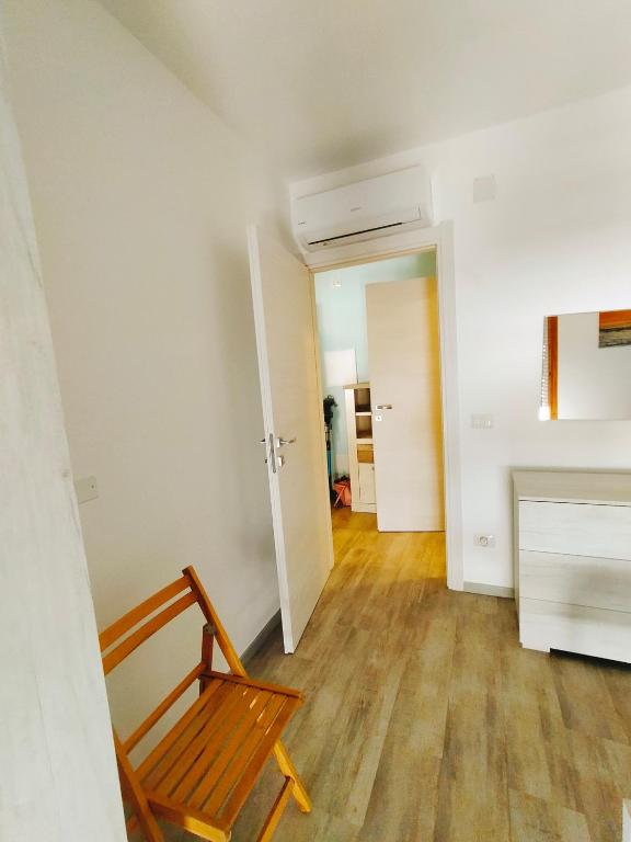 Postel nebo postele na pokoji v ubytování IL PICCOLO REMO