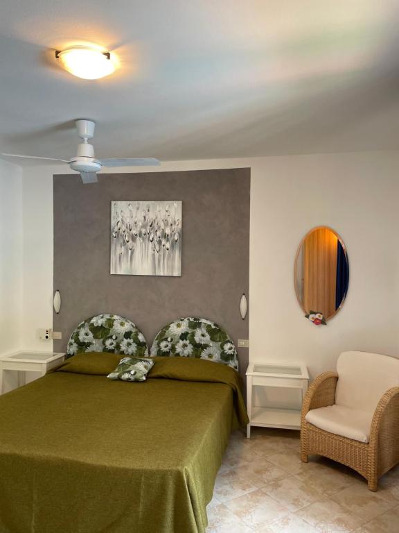 Postel nebo postele na pokoji v ubytování Hotel Casa Popi