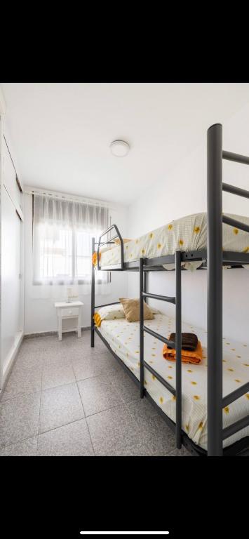 Postel nebo postele na pokoji v ubytování Beach Apartment in Calafell
