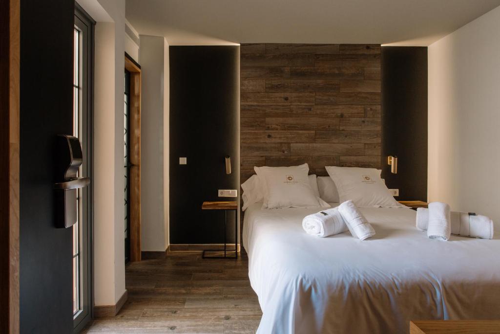 Postel nebo postele na pokoji v ubytování Pou by Seaward Suites
