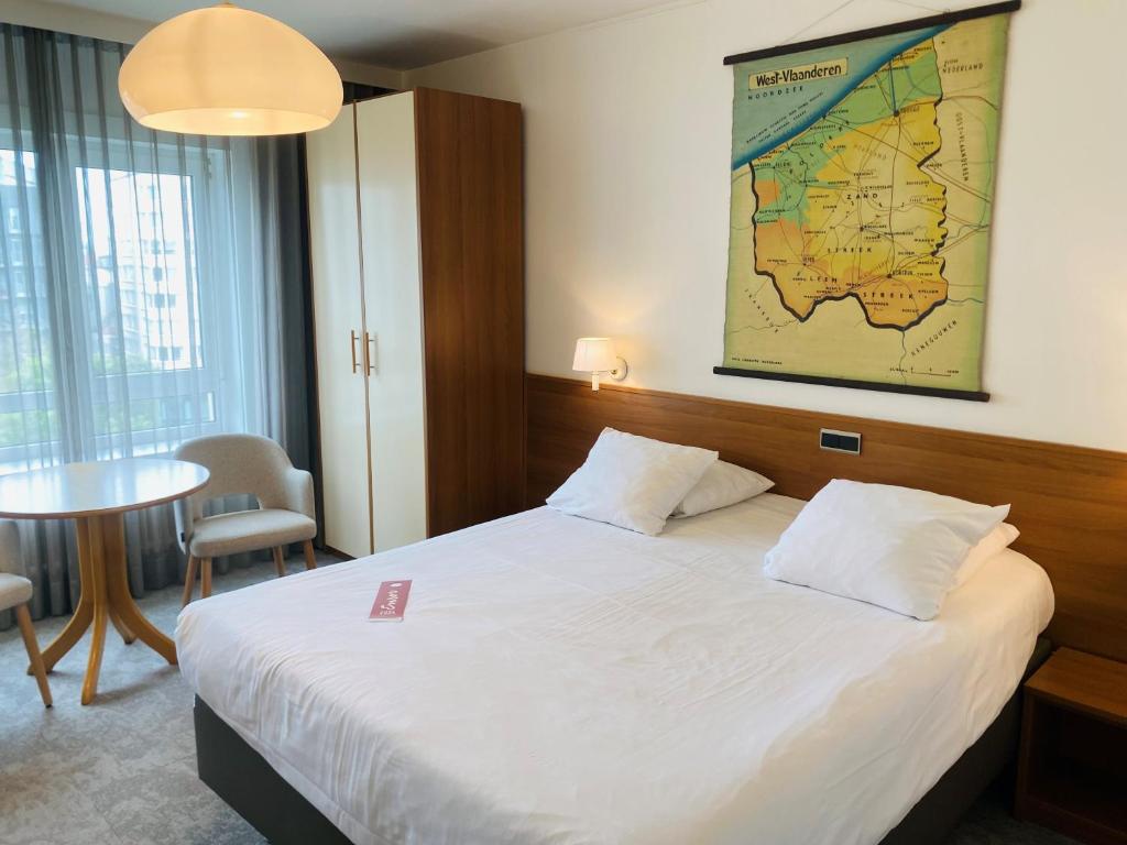 Postel nebo postele na pokoji v ubytování Hotel Prado