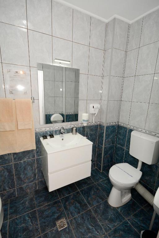 Koupelna v ubytování Hotel Andre´s