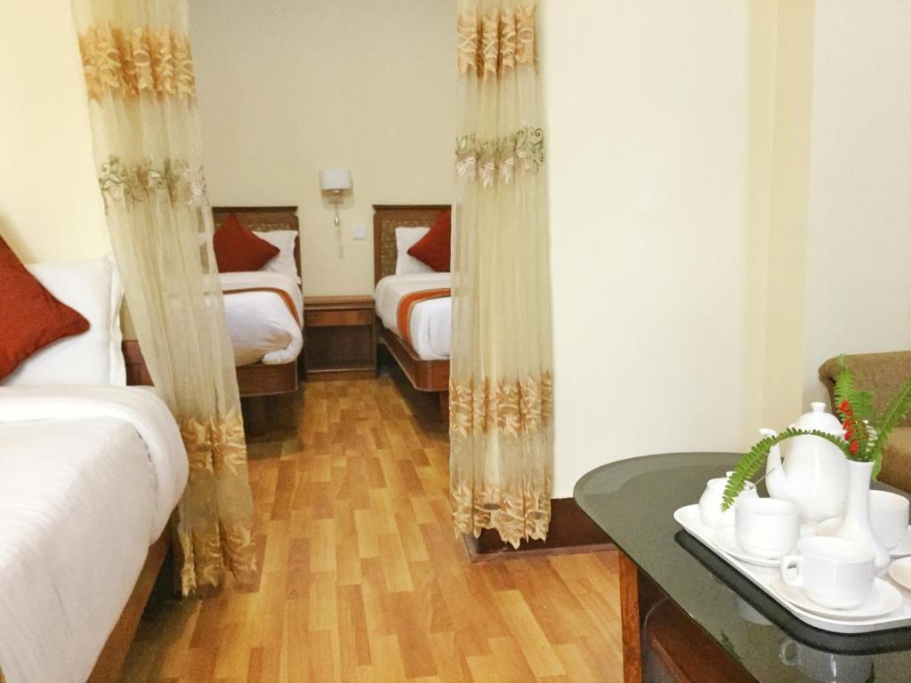 Postel nebo postele na pokoji v ubytování Trekkers Home