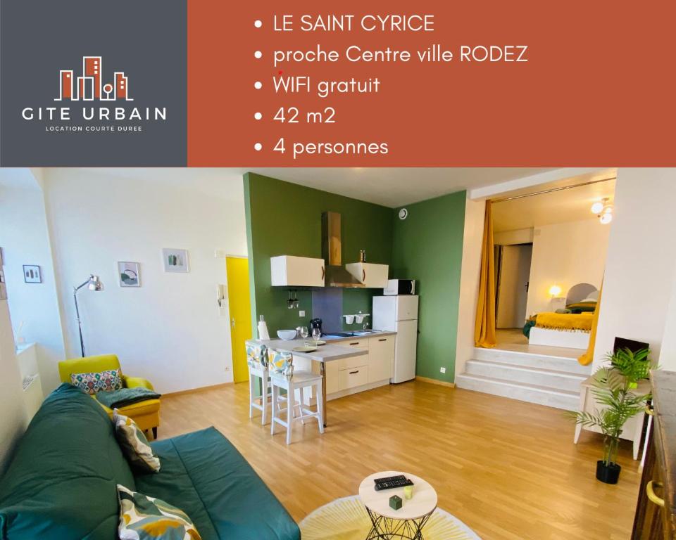 a living room with a green couch and a kitchen at LE SAINT CYRICE in Rodez