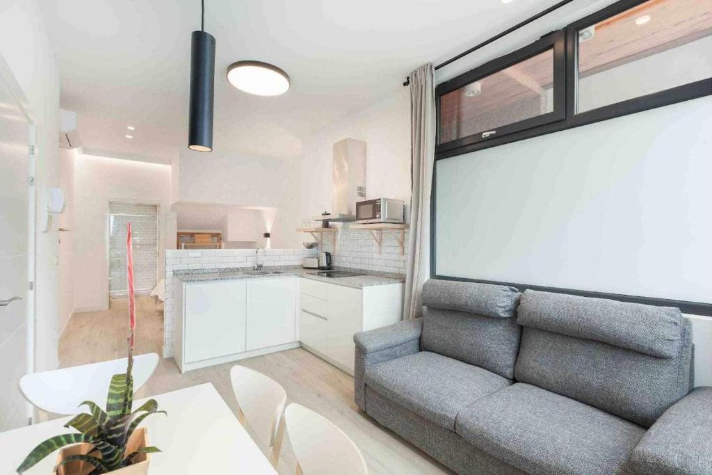 A kitchen or kitchenette at LUR Apartments Getaria