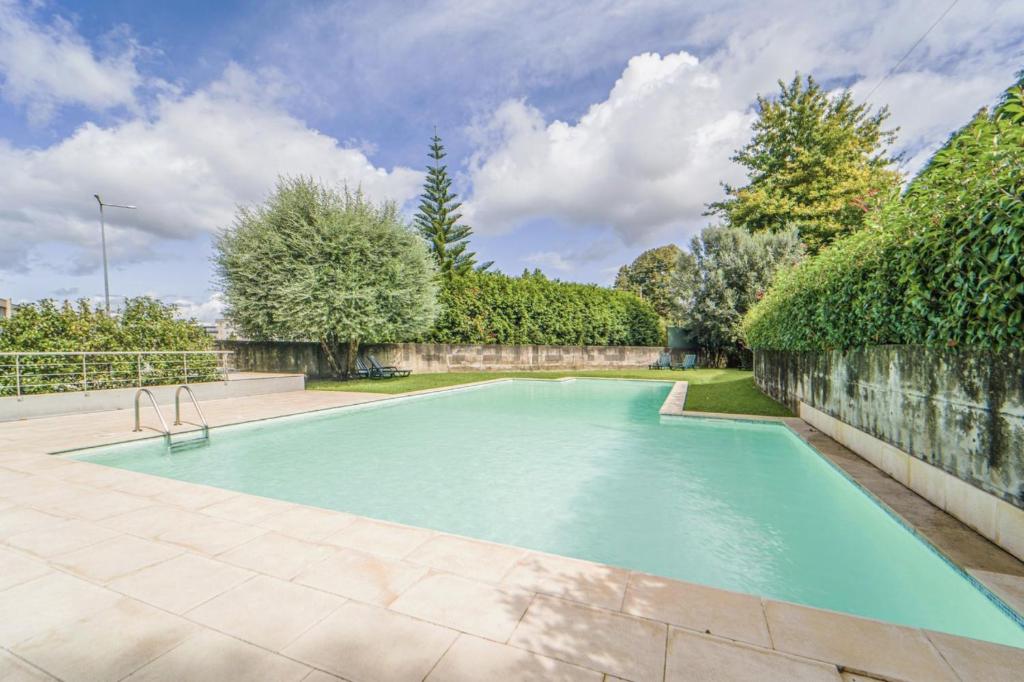 Kolam renang di atau dekat dengan Braga Exclusive flat with pool