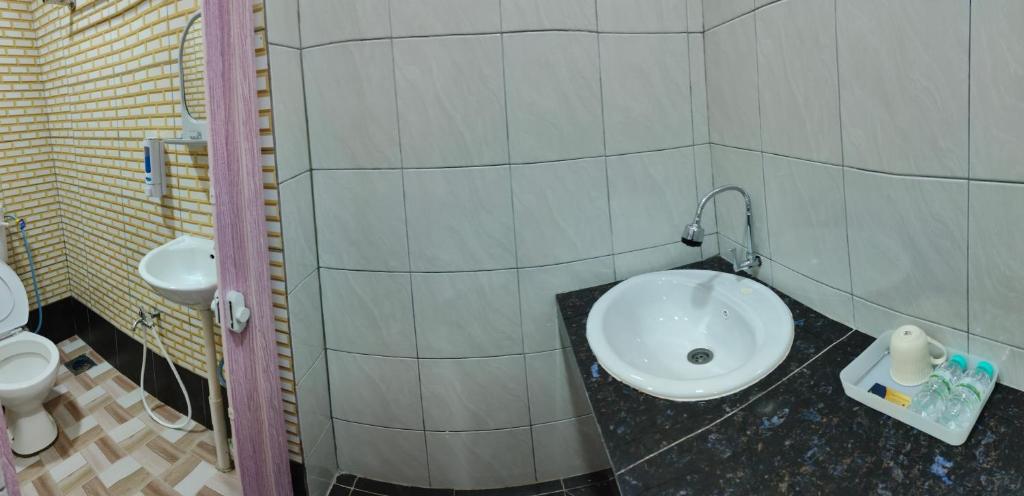 Koupelna v ubytování Santai Desa Chalet musleem 0nly