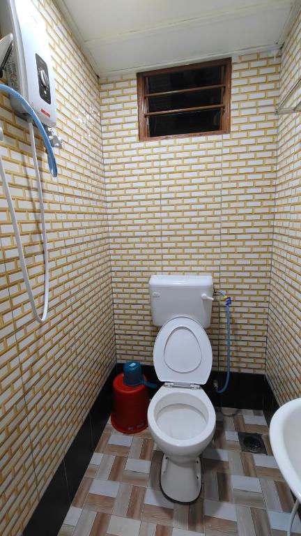 Koupelna v ubytování Santai Desa Chalet musleem 0nly