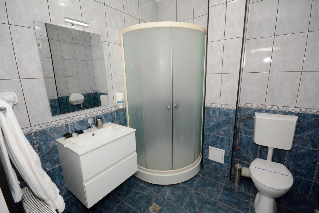 Koupelna v ubytování Hotel Andre´s