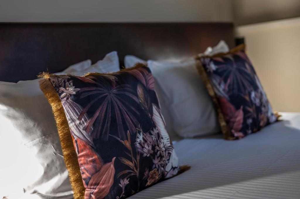 Postel nebo postele na pokoji v ubytování Hotel Onderbergen