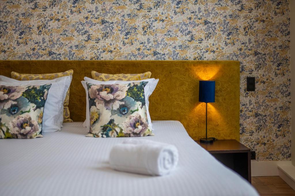 Postel nebo postele na pokoji v ubytování Hotel Onderbergen